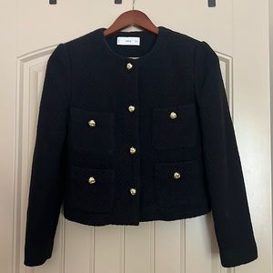 Cute cotton blend black tweed jacket.  Worn only once for a few hours.